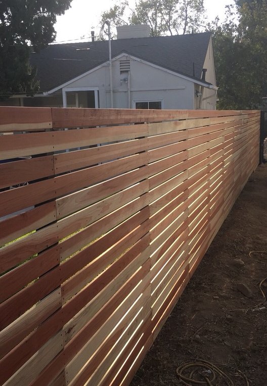 this is a picture of redwood fence in Carmichael, CA